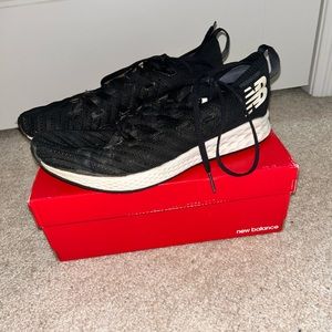 Black New Balance sneakers